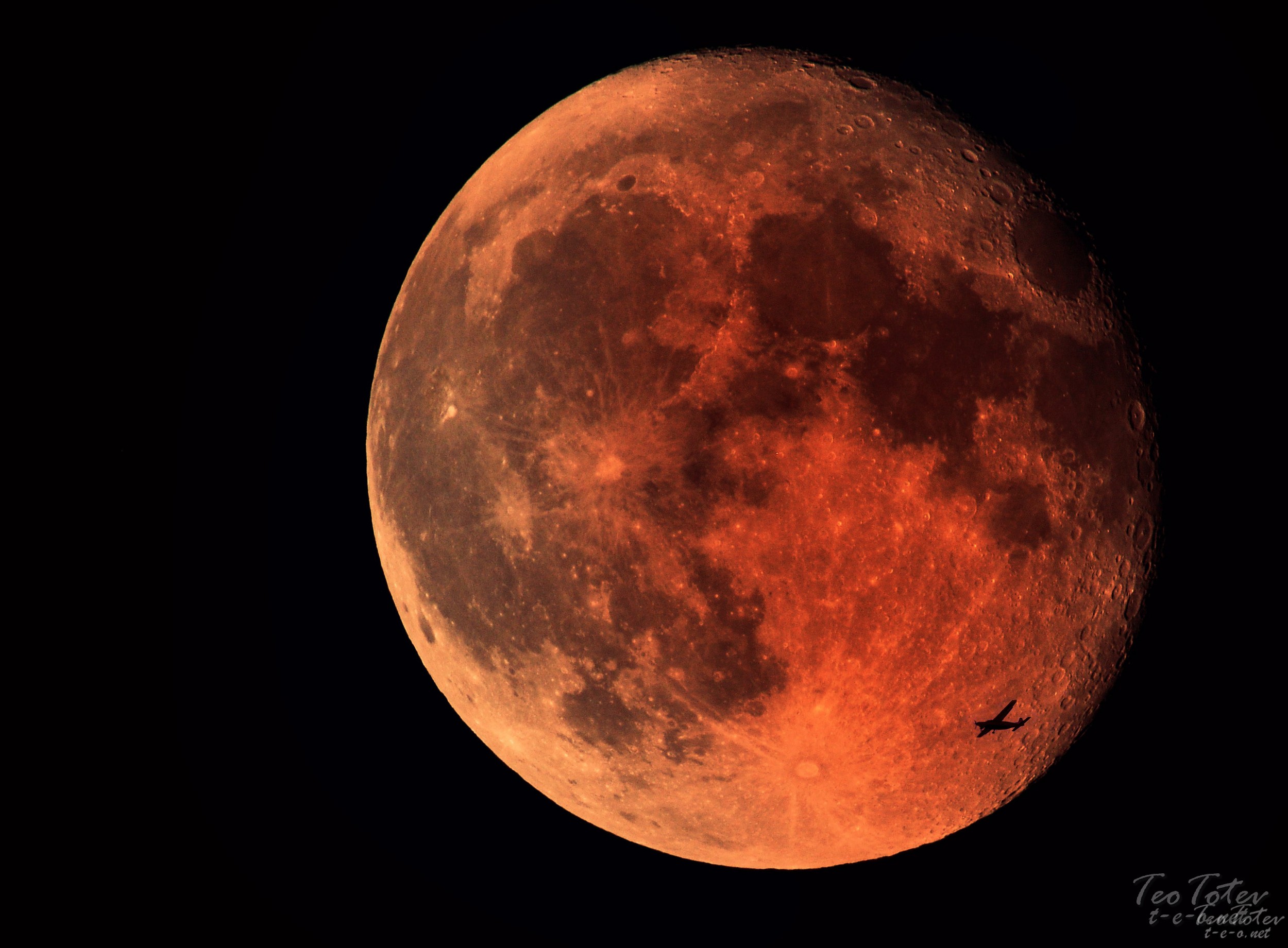 Moon photo with airplane in front