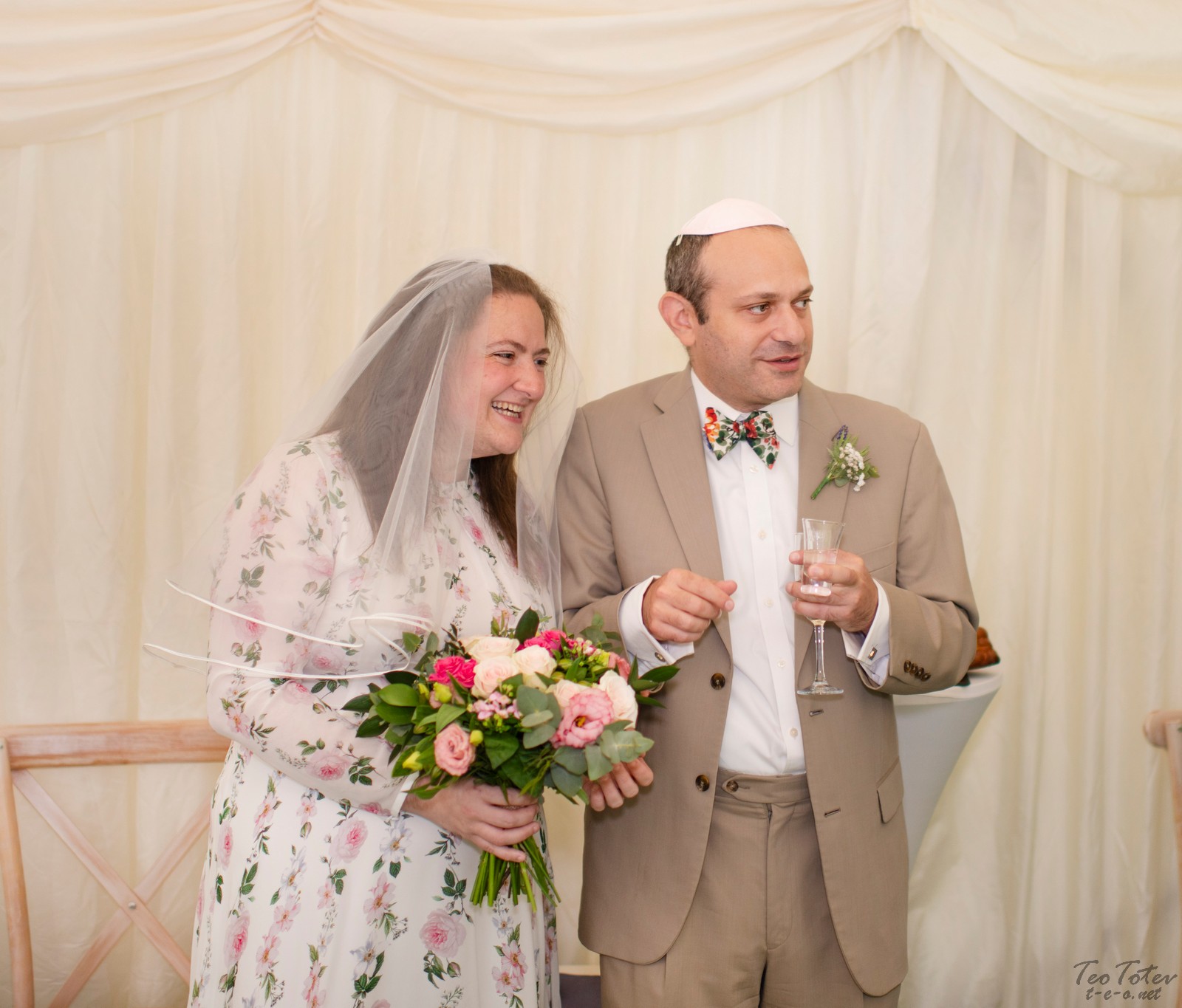 Newlyweds with flowers
